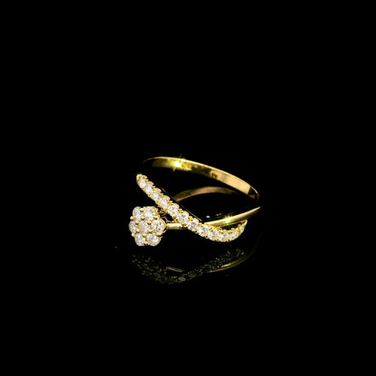 Diamond cluster crossover ring with round diamonds in 18K yellow gold by Emirates Diamonds