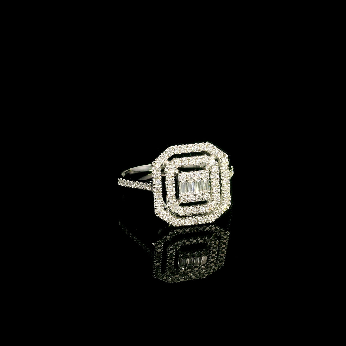 Baguette and round diamond halo ring in 18K white gold