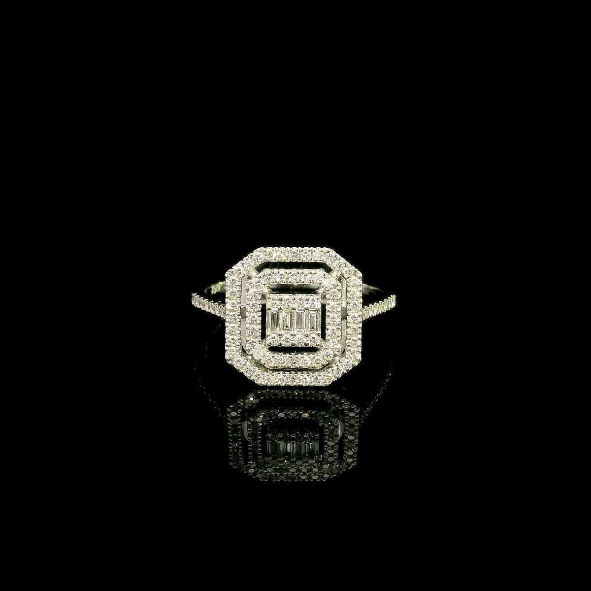 Baguette and round diamond halo ring in 18K white gold