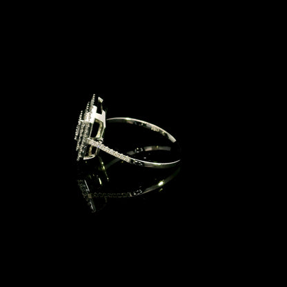 Baguette and round diamond halo ring in 18K white gold