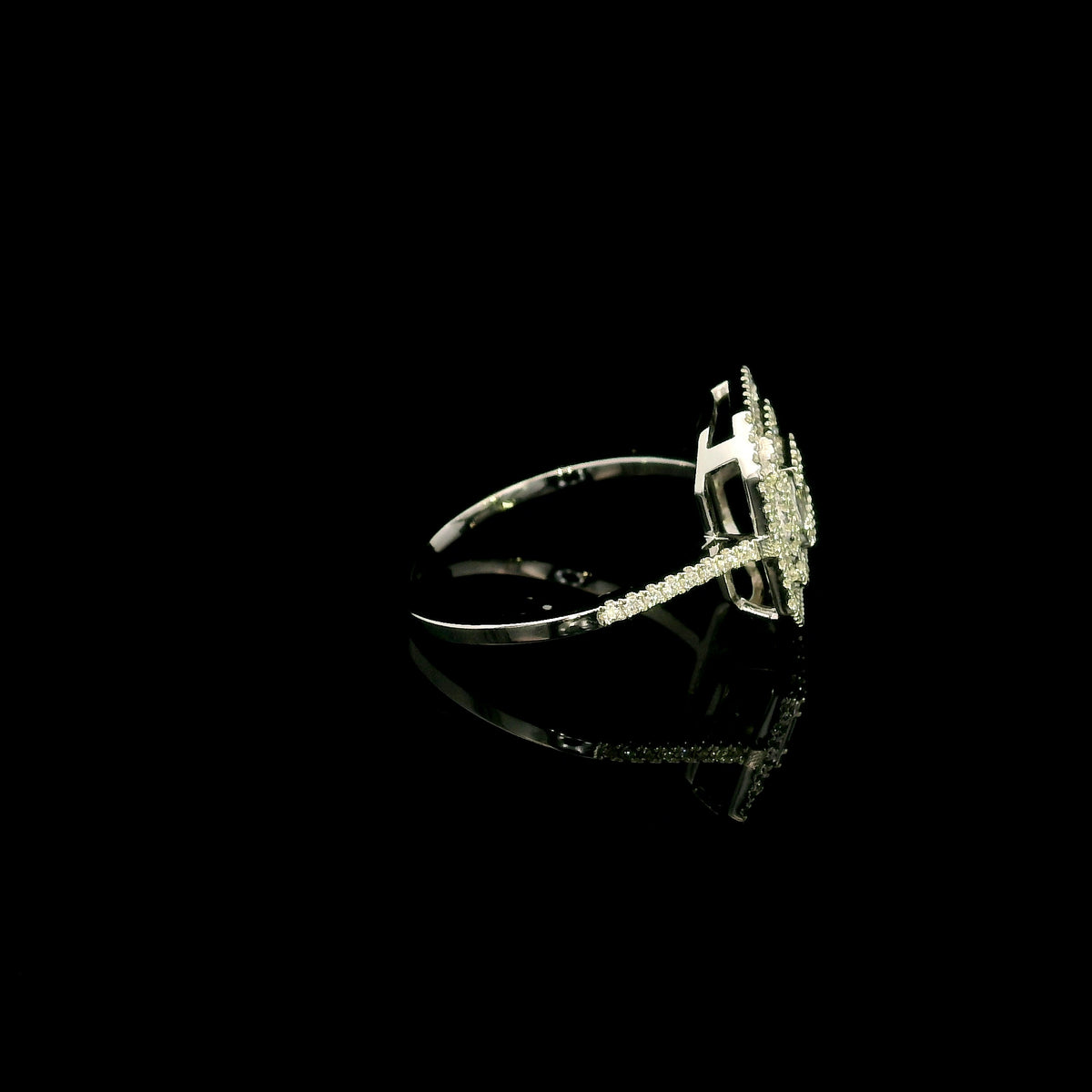 Baguette and round diamond halo ring in 18K white gold