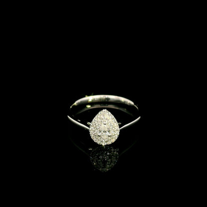 Pear shaped diamond halo ring in 18K white gold with round diamond halo