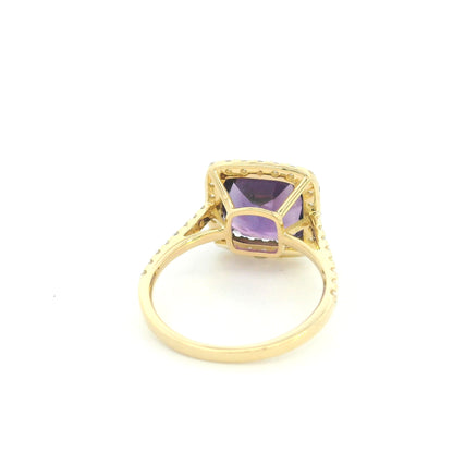 18K yellow gold cushion amethyst and diamond halo ring with purple amethyst, round diamond surround and diamond-set band