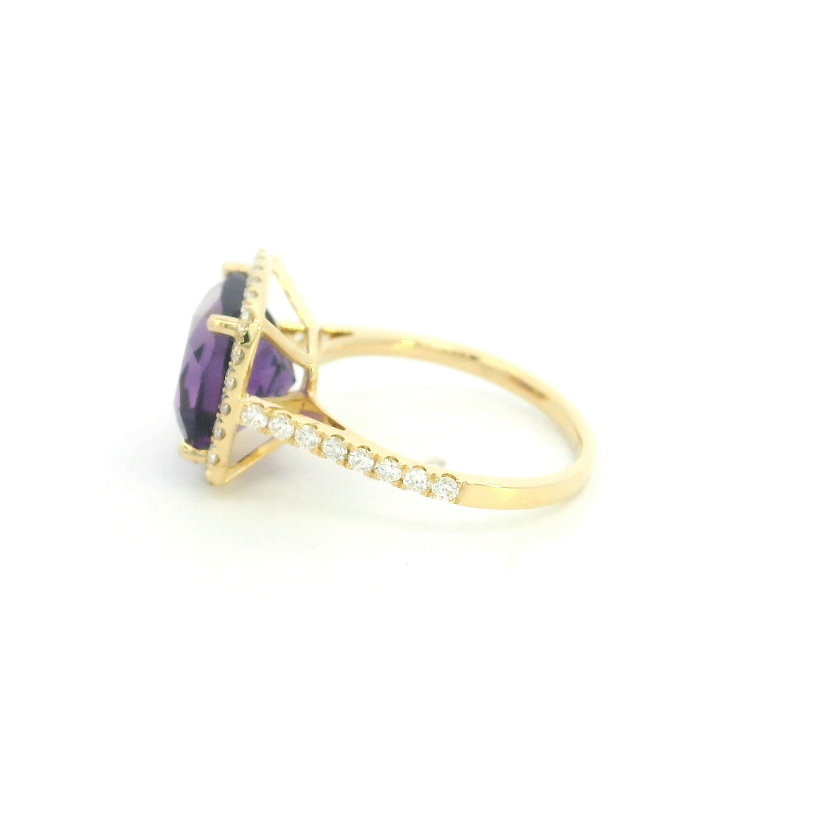 18K yellow gold cushion amethyst and diamond halo ring with purple amethyst, round diamond surround and diamond-set band