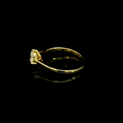 Six-prong 1 carat diamond solitaire engagement ring in 18K yellow gold, side view