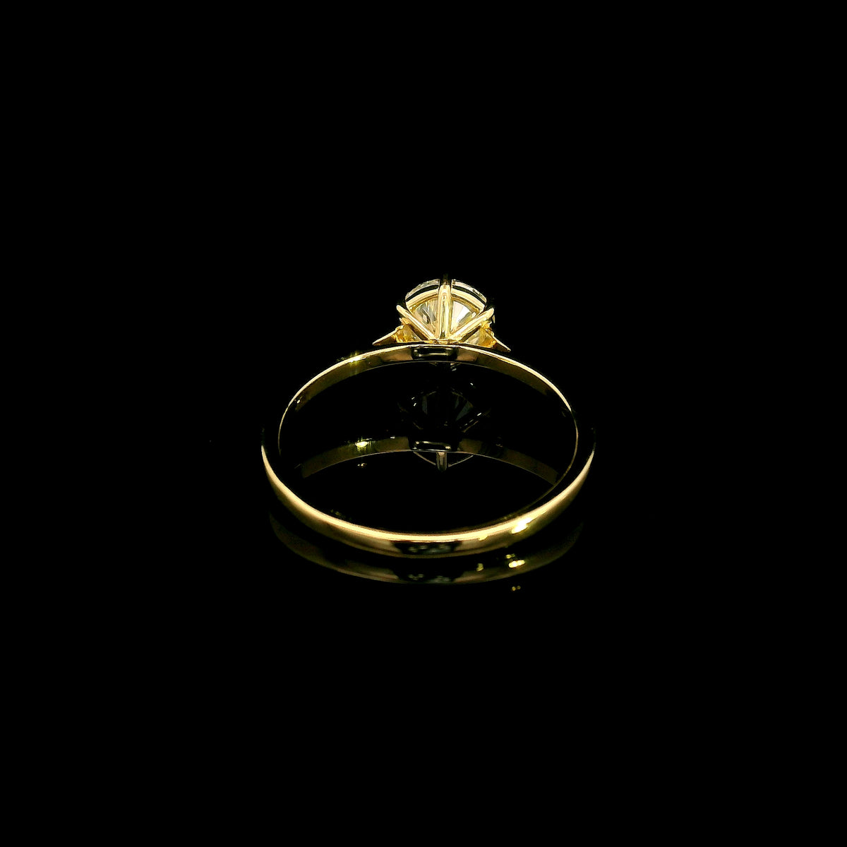 Six-prong 1 carat diamond solitaire engagement ring in 18K yellow gold, back view