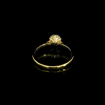 Six-prong 1 carat diamond solitaire engagement ring in 18K yellow gold, back view