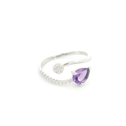 Amethyst and diamond ring in 18K white gold with pear shaped amethyst, diamond cluster and open band