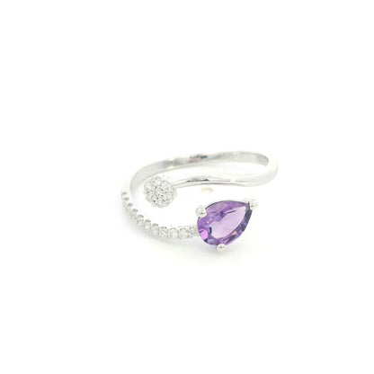Amethyst and diamond ring in 18K white gold with pear shaped amethyst, diamond cluster and open band