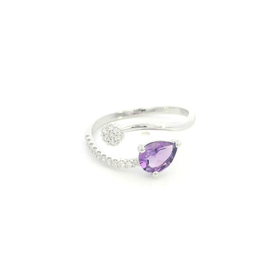 Amethyst and diamond ring in 18K white gold with pear shaped amethyst, diamond cluster and open band