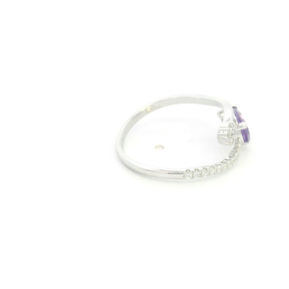 Amethyst and diamond ring in 18K white gold with pear shaped amethyst, diamond cluster and open band