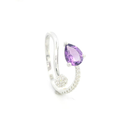 Amethyst and diamond ring in 18K white gold with pear shaped amethyst, diamond cluster and open band