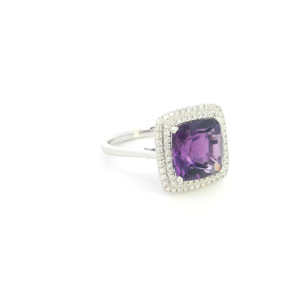 Cushion cut amethyst diamond halo ring in 18K white gold with double diamond halo