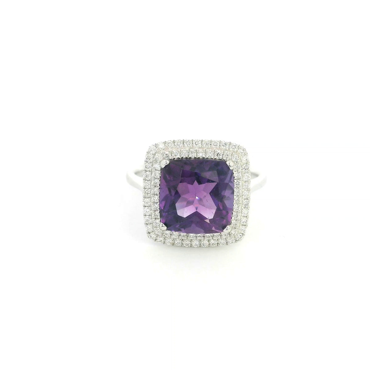 Cushion cut amethyst diamond halo ring in 18K white gold with double diamond halo