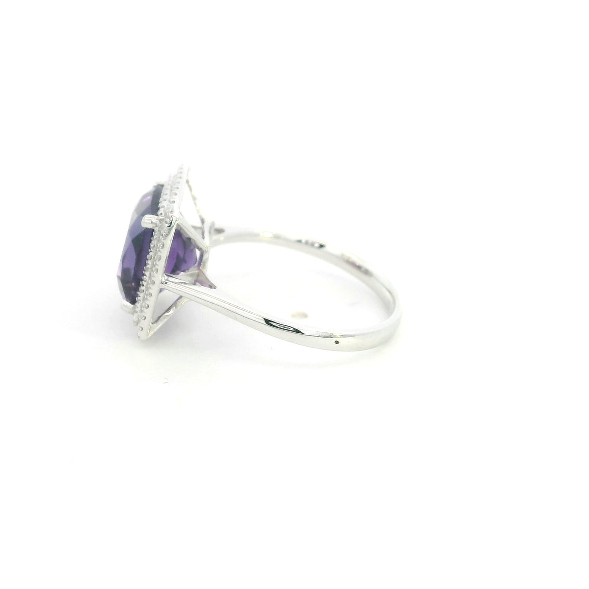 Cushion cut amethyst diamond halo ring in 18K white gold with double diamond halo