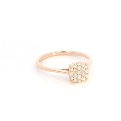 Diamond cluster ring in 18K rose gold featuring round brilliant diamonds arranged across a delicate polished band.