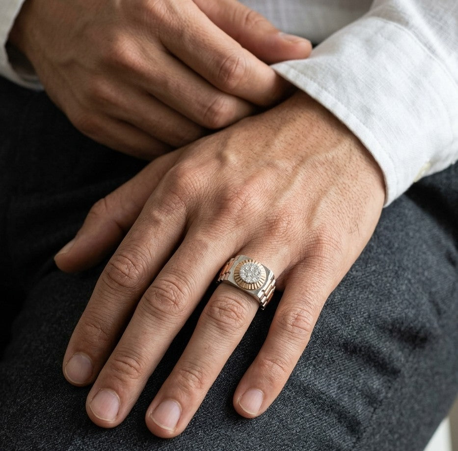 Men’s diamond ring in 18K white and rose gold with circular diamond centre and two-tone wide band