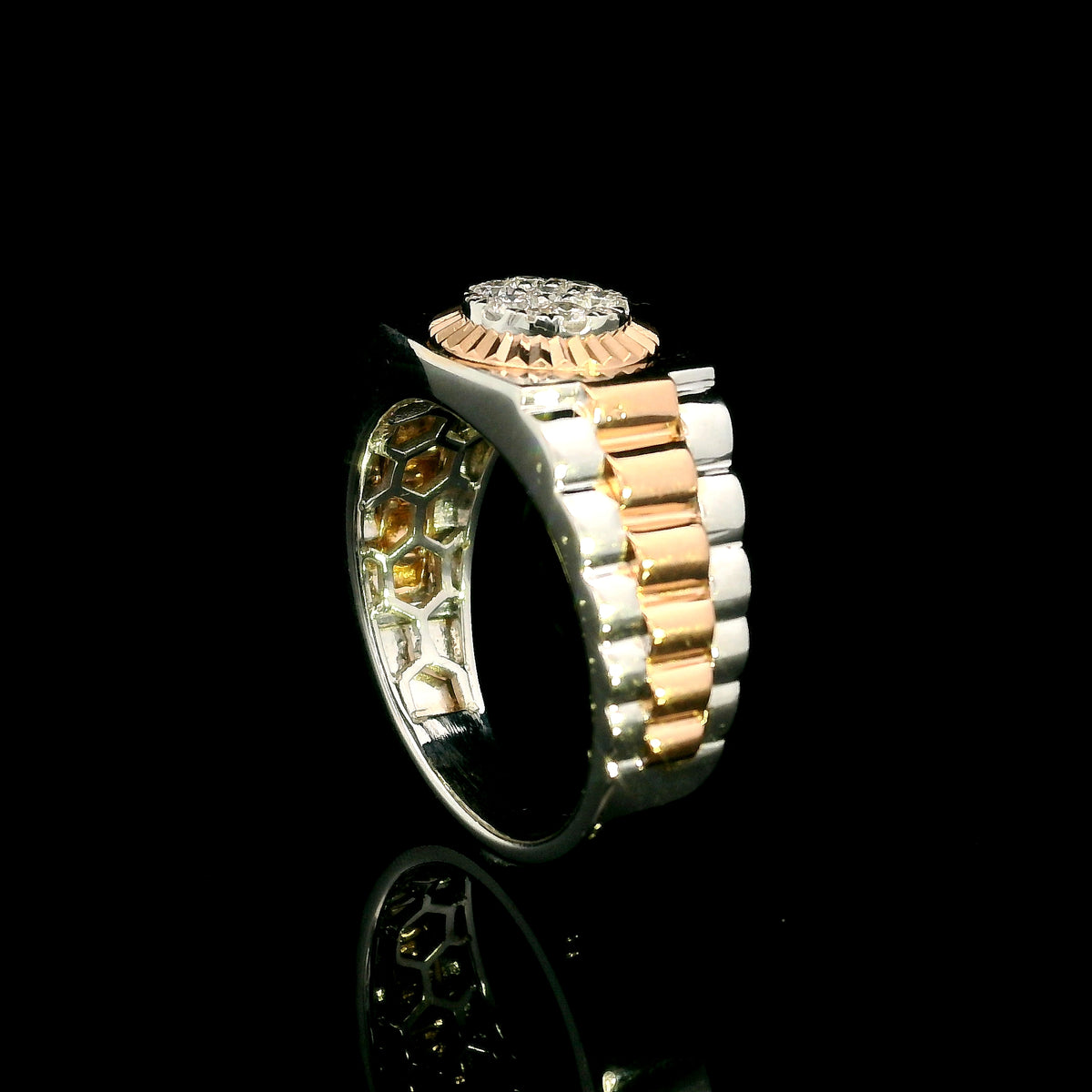 Men’s diamond ring in 18K white and rose gold with circular diamond centre and two-tone wide band
