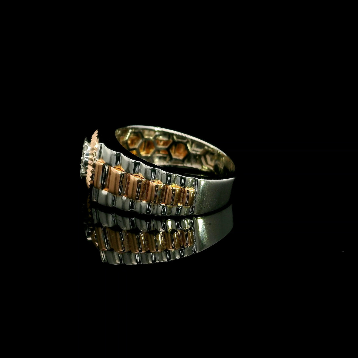 Men’s diamond ring in 18K white and rose gold with circular diamond centre and two-tone wide band