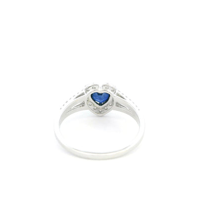Heart shaped blue sapphire and diamond ring in 18K white gold with diamond split band