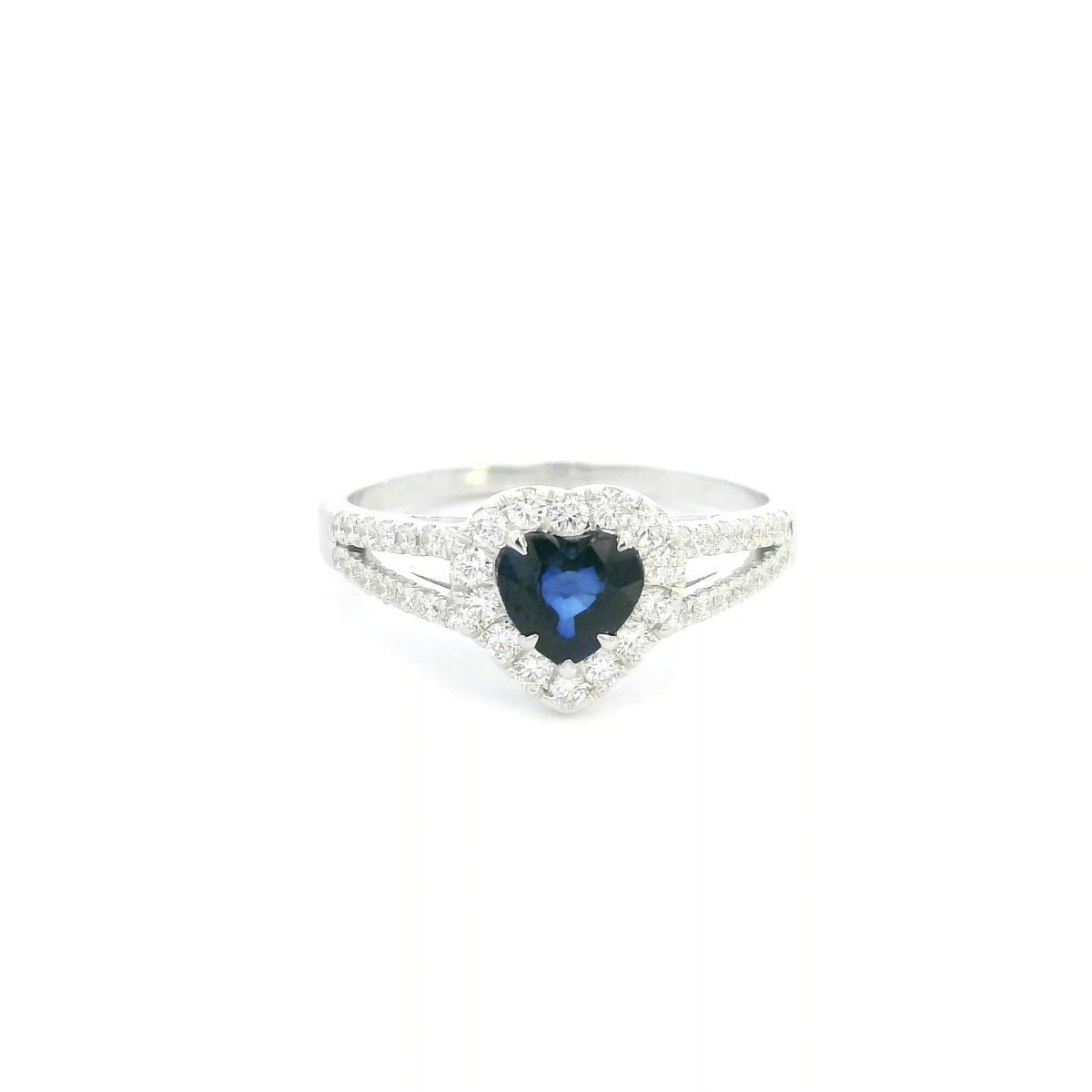Heart shaped blue sapphire and diamond ring in 18K white gold with diamond split band
