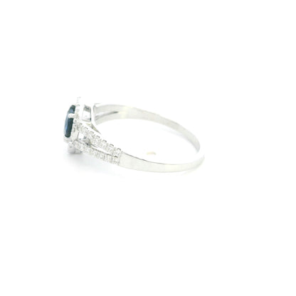 Heart shaped blue sapphire and diamond ring in 18K white gold with diamond split band