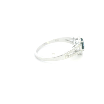 Heart shaped blue sapphire and diamond ring in 18K white gold with diamond split band