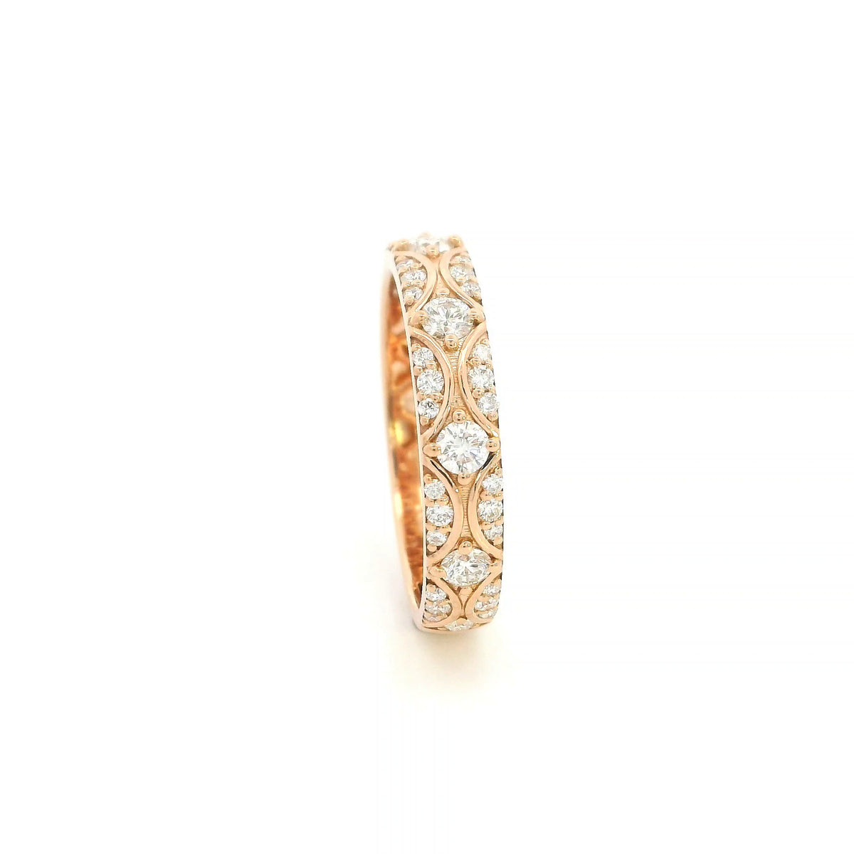 Vintage-style diamond eternity band in 18K rose gold with round diamonds and intricate curved detailing