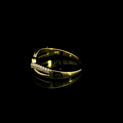 Diamond crossover ring in 18K yellow gold with polished and pavé diamond twist design