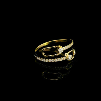 Diamond open bypass ring in 18K yellow gold with round diamonds, sweeping diamond-set curves and polished gold loops.