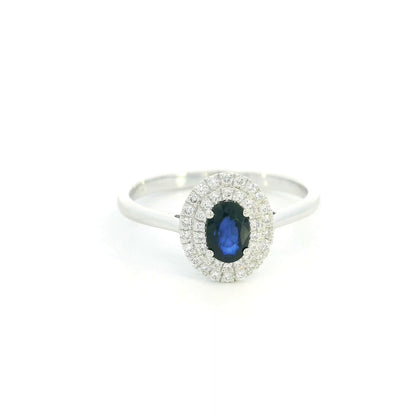 Oval blue sapphire double diamond halo ring in 18K white gold by Emirates Diamonds
