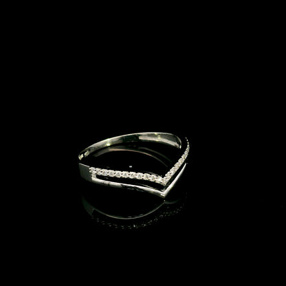 18K white gold diamond chevron wedding band with a layered polished and diamond-set V-shaped design by Emirates Diamonds.