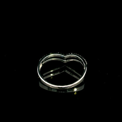 18K white gold diamond chevron wedding band with a layered polished and diamond-set V-shaped design by Emirates Diamonds.