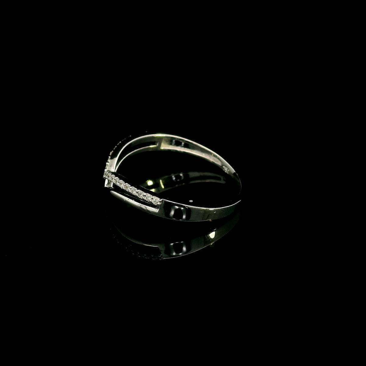 18K white gold diamond chevron wedding band with a layered polished and diamond-set V-shaped design by Emirates Diamonds.