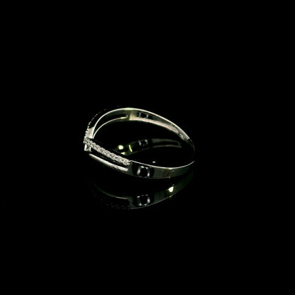 18K white gold diamond chevron wedding band with a layered polished and diamond-set V-shaped design by Emirates Diamonds.