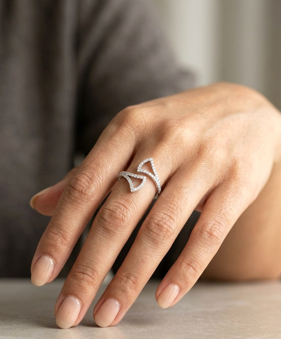 Diamond open statement ring in 18K white gold with sculptural pointed diamond-set curves