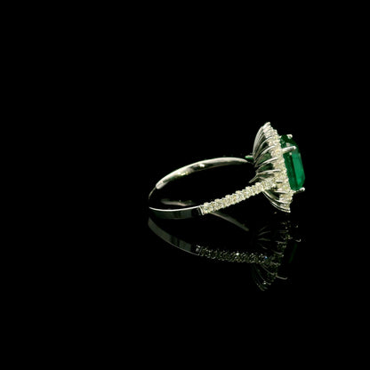 Emerald and Diamond Halo Ring in 18K White Gold