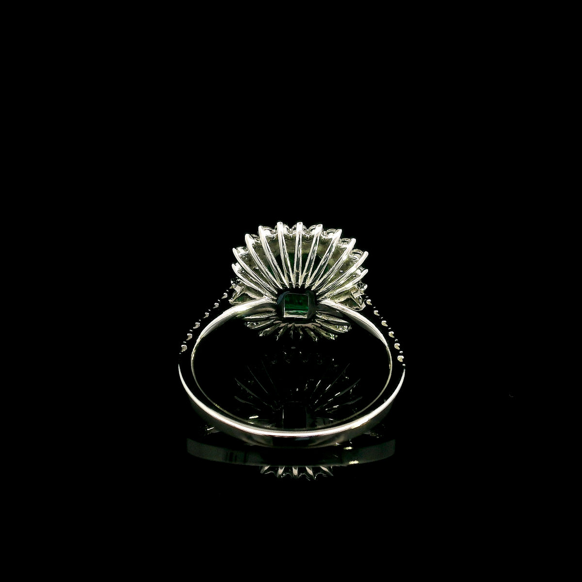 Emerald and Diamond Halo Ring in 18K White Gold