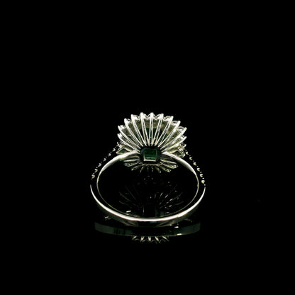 Emerald and Diamond Halo Ring in 18K White Gold