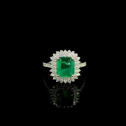 Emerald and Diamond Halo Ring in 18K White Gold