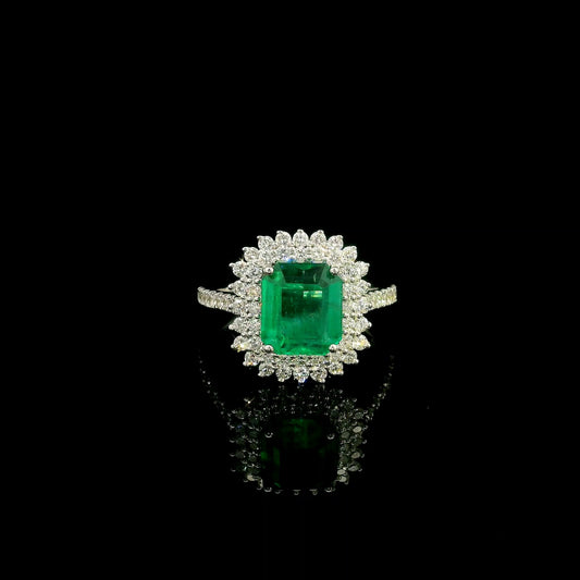 Emerald and Diamond Halo Ring in 18K White Gold