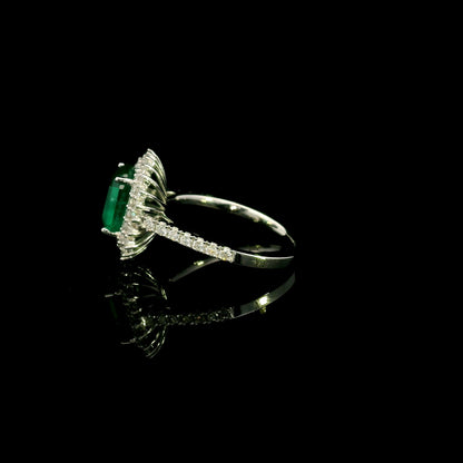 Emerald and Diamond Halo Ring in 18K White Gold