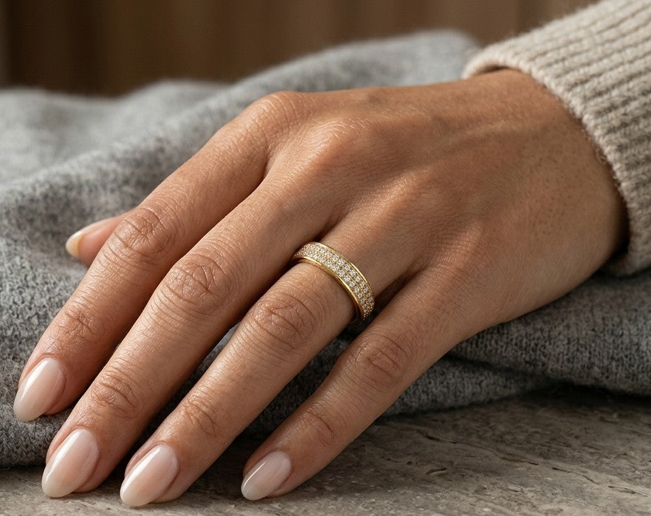 Double row diamond band ring in 18K yellow gold featuring two rows of round diamonds framed by polished gold edges.