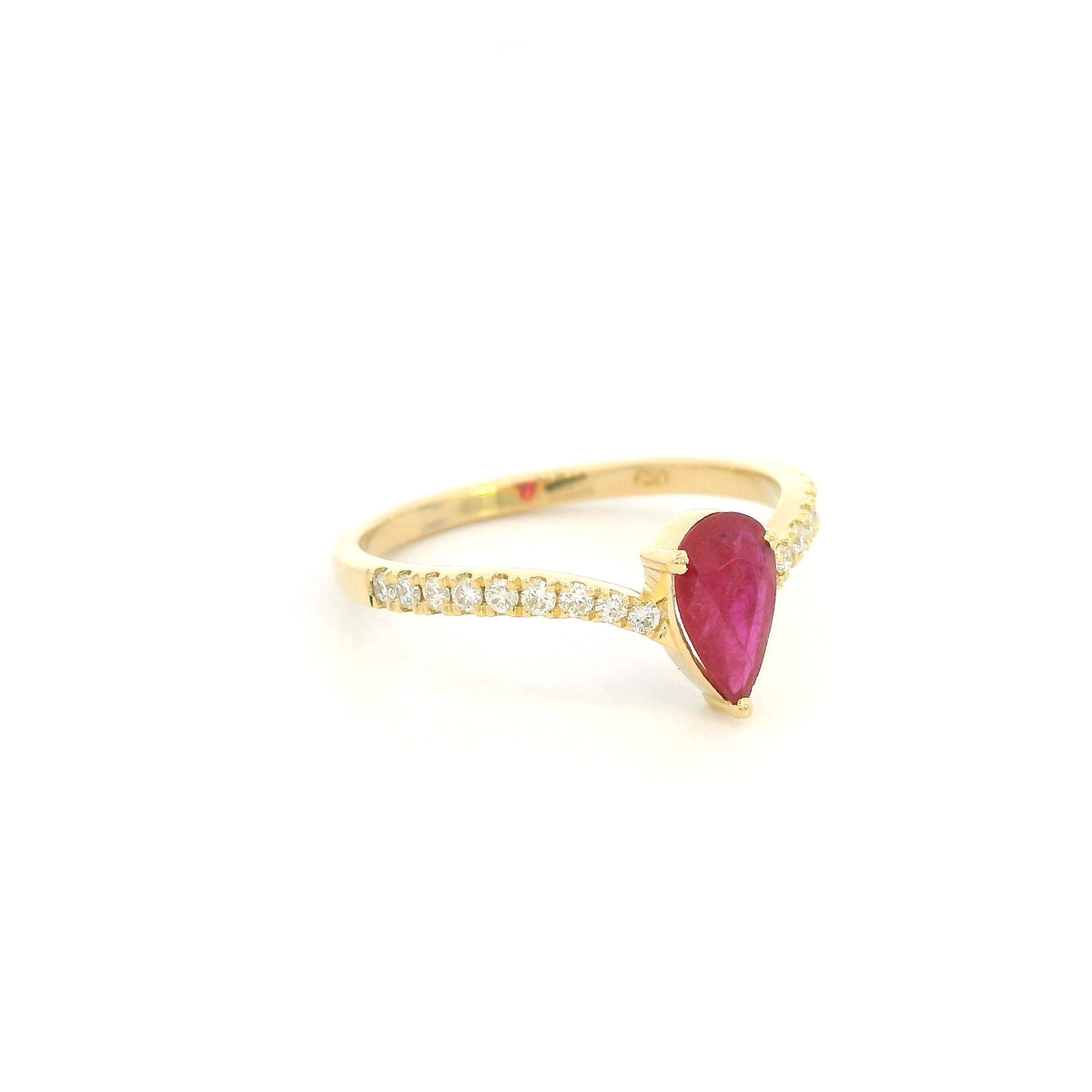 Pear shaped ruby and diamond ring in 18K yellow gold with diamond set shoulders