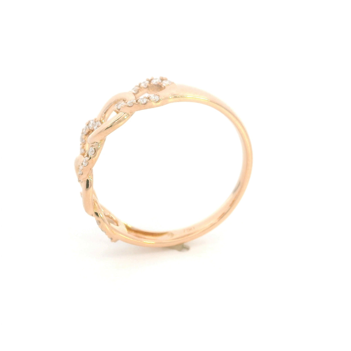 18K rose gold diamond loop ring with repeating polished and diamond-set curved motifs.
