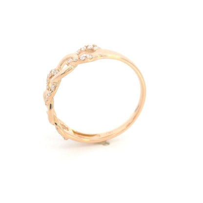 18K rose gold diamond loop ring with repeating polished and diamond-set curved motifs.