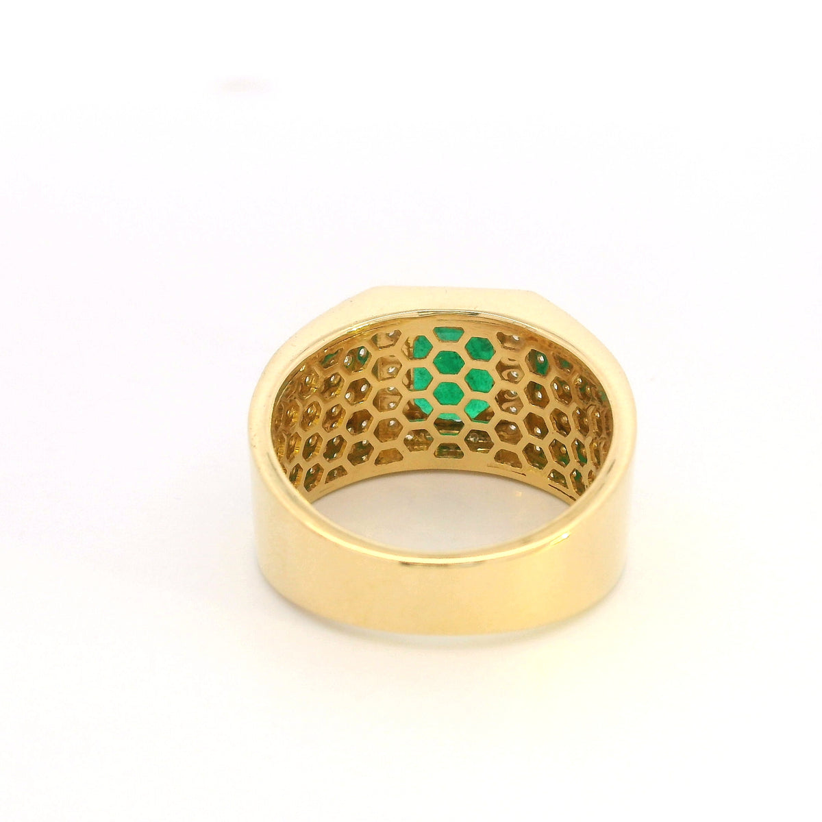 Men’s emerald and diamond ring in 18K yellow gold with emerald cut emerald and diamond-set wide band