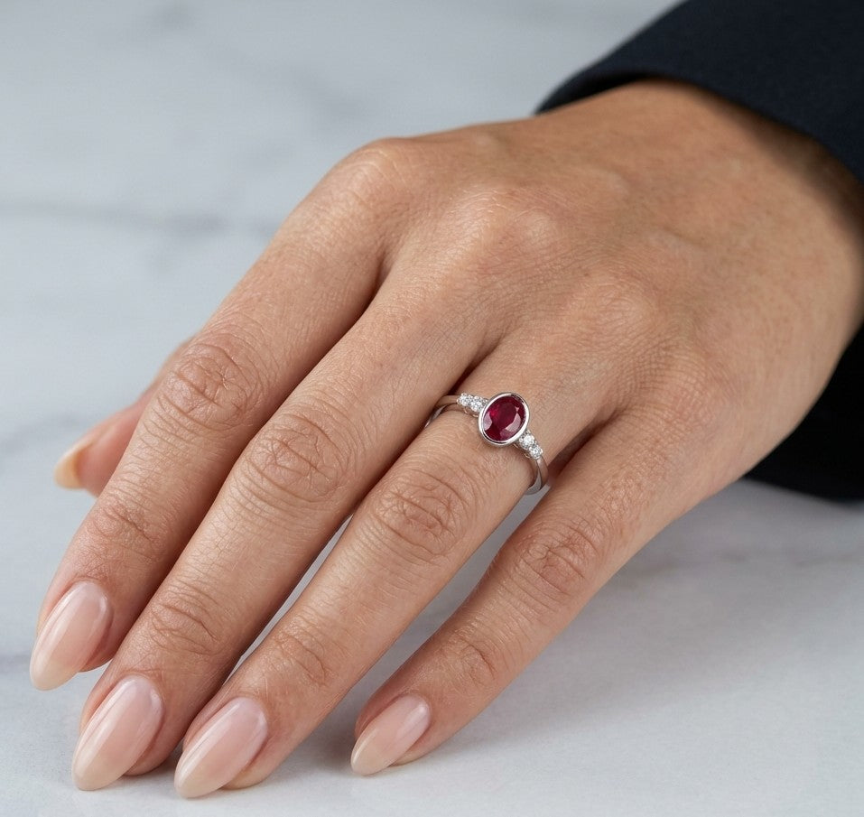 Oval ruby and diamond ring in 18K white gold
