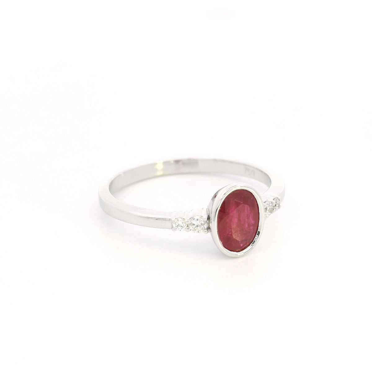 Oval ruby and diamond ring in 18K white gold