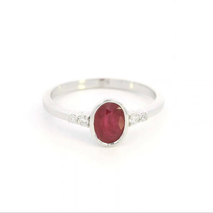 Oval ruby and diamond ring in 18K white gold